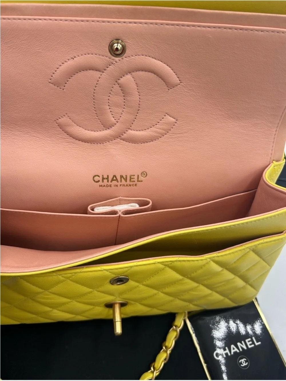 Women’s Chanel, classic quilted double flap bag in yellow with Gould hardware